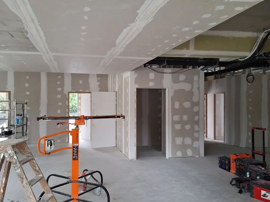 Drywall taping and mudding in progress